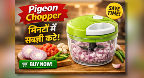 Pigeon chopper से मिनटों में सब्जी काटते हुए, हरे ढक्कन वाला Pigeon Polypropylene Mini Handy चॉपर, प्याज टमाटर और मिर्च के साथ किचन में रखा हुआ।